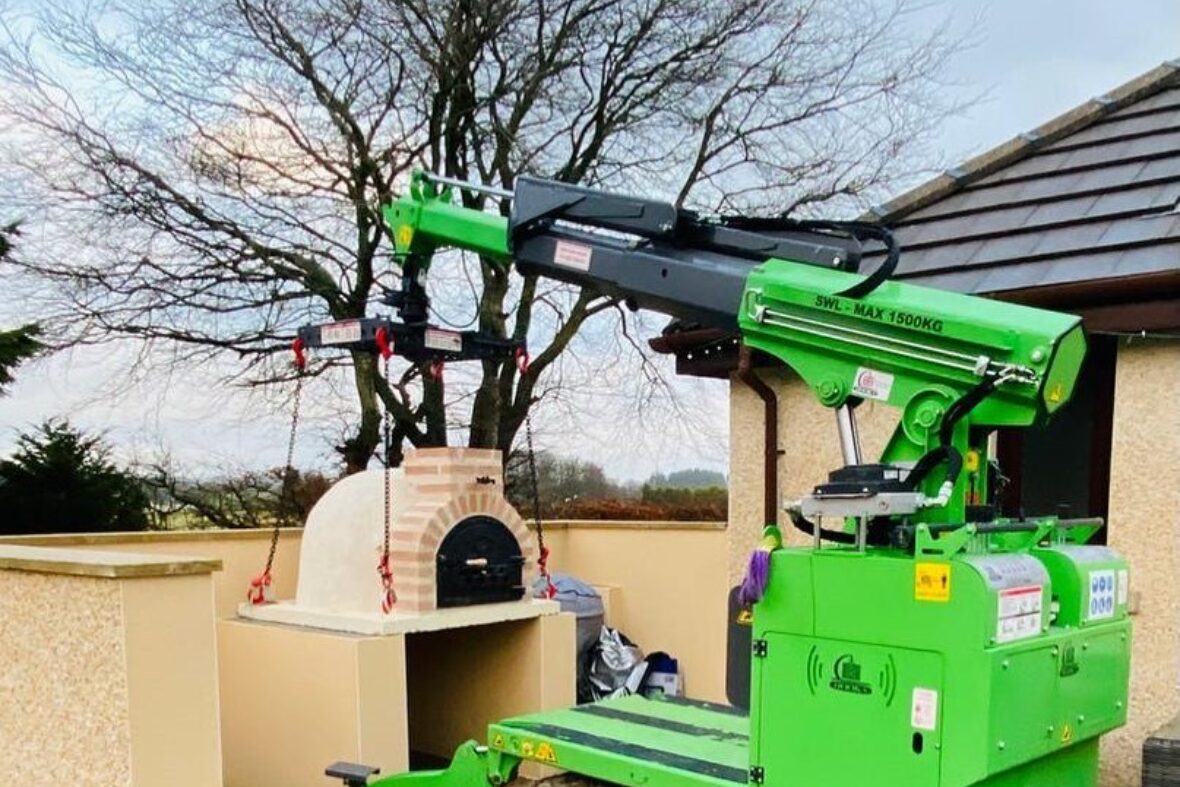 Team conducting pizza oven transport